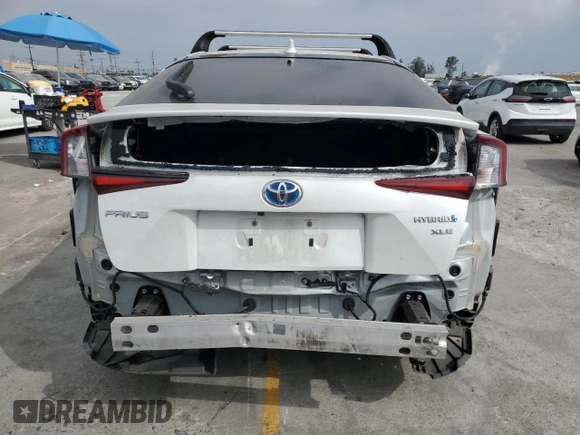 2021 Toyota Prius L Eco with VIN JTDKAMFUXM3149396, listed as a Copart auction lot 61874195 with 126,473 mi miles and Salvage title. Bid and sale history available at DreamBid. Image 6.