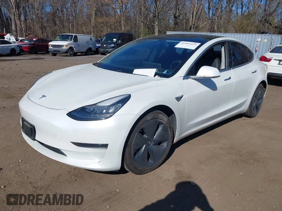 2020 Tesla Model 3 Standard Range Plus with VIN 5YJ3E1EA0LF783672, listed as a IAAI auction lot 41903431 with 52,157 mi miles and . Bid and sale history available at carsss.com. Image 20.