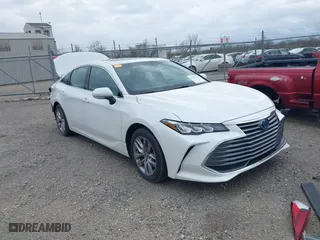 2022 Toyota Avalon Hybrid XLE with VIN 4T1AA1ABXNU015401, listed as a IAAI auction lot 41947755 with 52,867 mi miles. Bid and sale history available at carsss.com. Image 1.