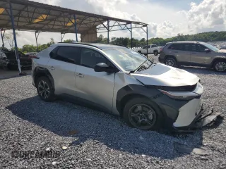 2024 Toyota bZ4X XLE with VIN JTMABACA4RA056975, listed as a Copart auction lot 58435305 with 24,205 mi miles and Salvage title. Bid and sale history available at DreamBid. Image 4.