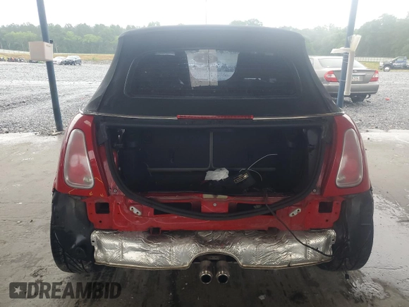 2005 MINI Convertible S с VIN WMWRH334X5TF82551, выставлен на аукционе Copart как лот 57983355 с пробегом 73 885 миль миль и Списание • Salvage title. История ставок и продаж доступна на DreamBid. Изображение 6.