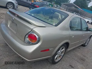 2003 Nissan Maxima SE z VIN JN1DA31D33T510169, wystawiony jako IAAI lot #42339254 z przebiegiem 182 862 mil mil oraz . Historia ofert i sprzedaży dostępna na DreamBid. Obrazek 4.