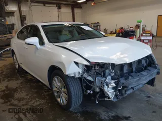 2013 Lexus ES 300h Hybrid with VIN JTHBW1GG4D2036539, listed as a IAAI auction lot 42121701 with 157,855 mi miles. Bid and sale history available at carsss.com. Image 1.