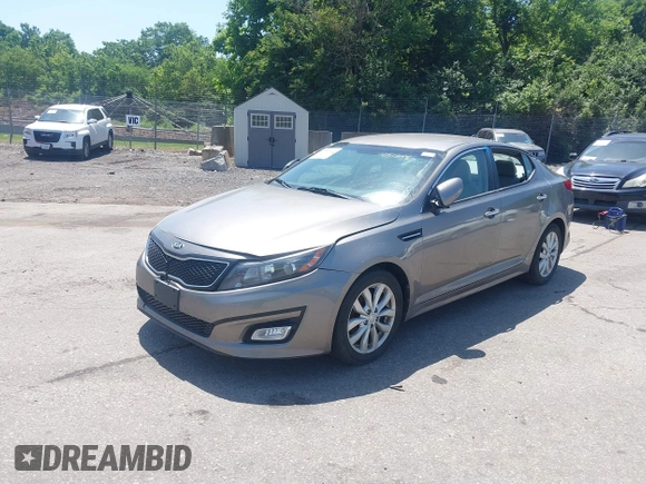 2015 Kia Optima LX with VIN 5XXGM4A75FG451244, listed as a IAAI auction lot 42582899 with 109,152 mi miles and . Bid and sale history available at DreamBid. Image 2.