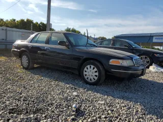 2002 Ford Crown Victoria Police with VIN 2FAFP71W52X157857, listed as a Copart auction lot 65963304 with 203,427 mi miles and Clean Title. Bid and sale history available at carsss.com. Image 4.