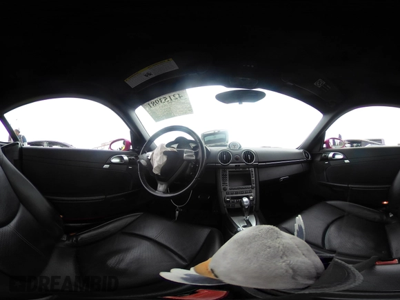 2007 Porsche Cayman S with VIN WP0AB29877U780410, listed as a IAAI auction lot 42153981 with 74,366 mi miles and . Bid and sale history available at DreamBid. Image 18.