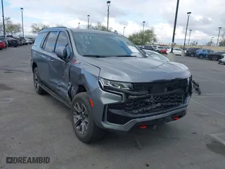 2022 Chevrolet Tahoe Z71 with VIN 1GNSKPKD3NR265727, listed as a IAAI auction lot 41212836 with 15,435 mi miles. Bid and sale history available at carsss.com. Image 1.