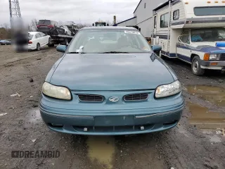 1998 Oldsmobile Cutlass GLS with VIN 1G3NG52M8W6317027, listed as a Copart auction lot 45513674 with 58,170 mi miles and Clean Title. Bid and sale history available at DreamBid. Image 5.