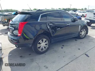 2014 Cadillac SRX Luxury Collection with VIN 3GYFNBE36ES587292, listed as a IAAI auction lot 41944420 with 150,136 mi miles and . Bid and sale history available at DreamBid. Image 4.