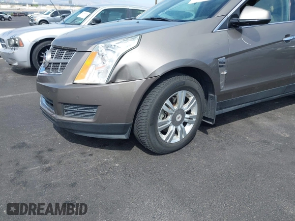 2012 Cadillac SRX Luxury Collection with VIN 3GYFNAE30CS612453, listed as a IAAI auction lot 42048235 with 173,982 mi miles and . Bid and sale history available at carsss.com. Image 6.