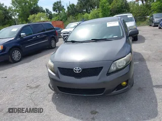 2010 Toyota Corolla with VIN 1NXBU4EE7AZ237289, listed as a IAAI auction lot 41877935 with 198,861 mi miles. Bid and sale history available at carsss.com. Image 11.
