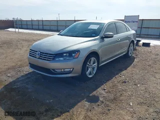 2014 Volkswagen Passat TDI SEL Premium with VIN 1VWCN7A33EC013425, listed as a IAAI auction lot 41381958 with 104,692 mi miles. Bid and sale history available at carsss.com. Image 17.