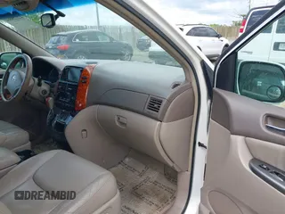 2007 Toyota Sienna XLE with VIN 5TDZK22C57S074123, listed as a IAAI auction lot 42128064 with 184,183 mi miles and . Bid and sale history available at DreamBid. Image 5.