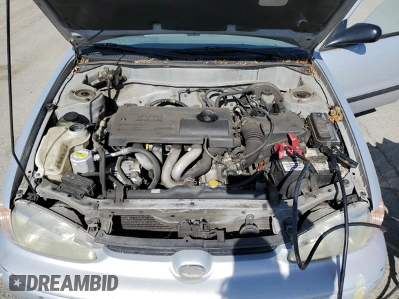 2002 Chevrolet Prizm z VIN 1Y1SK52862Z410699, wystawiony jako Copart lot #58118425 z przebiegiem 157 609 mil mil oraz Szkoda całkowita • Salvage title. Historia ofert i sprzedaży dostępna na DreamBid. Obrazek 11.