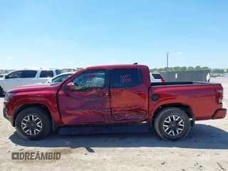 2022 Nissan Frontier Pro-4X z VIN 1N6ED1EK9NN634845, wystawiony jako IAAI lot #42094681 z przebiegiem 33 801 mil mil oraz . Historia ofert i sprzedaży dostępna na DreamBid. Obrazek 13.
