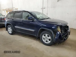 2012 Jeep Grand Cherokee Laredo with VIN 1C4RJFAG9CC221229, listed as a Copart auction lot 52035545 with 70,332 mi miles and Salvage Title. Bid and sale history available at carsss.com. Image 4.
