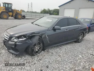 2014 Mercedes-Benz E 350 Luxury with VIN WDDHF8JB7EA986120, listed as a Copart auction lot 60742105 with 102,788 mi miles and Salvage title. Bid and sale history available at DreamBid. Image 1.