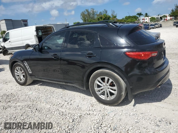 2014 Infiniti QX70 z VIN JN8CS1MU4EM451883, wystawiony jako Copart lot #61744725 z przebiegiem 60 393 mil mil oraz Czysty tytuł • Clean title. Historia ofert i sprzedaży dostępna na DreamBid. Obrazek 2.