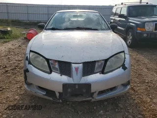 2004 Pontiac Sunfire z VIN 1G2JB12F047257585, wystawiony jako Copart lot #65168764 z przebiegiem 269 522 mil mil oraz Szkody całkowita. Historia ofert i sprzedaży dostępna na DreamBid. Obrazek 5.