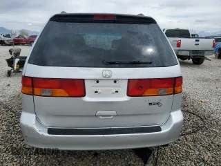 2004 Honda Odyssey EX-RES z VIN 5FNRL18804B121844, wystawiony jako Copart lot #53390135 z przebiegiem 284 065 mil mil oraz Szkoda całkowita • Salvage title. Historia ofert i sprzedaży dostępna na DreamBid. Obrazek 6.