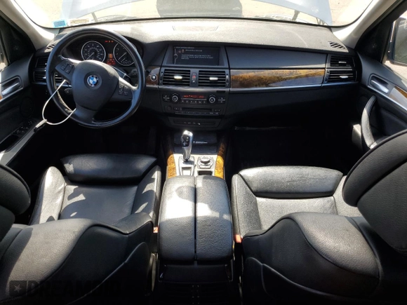 2012 BMW X5 35i with VIN 5UXZV4C5XCL749204, listed as a Copart auction lot 62012985 with 94,636 mi miles and Clean title. Bid and sale history available at DreamBid. Image 8.