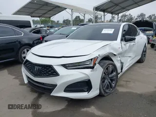 2022 Acura TLX w/A-Spec Package with VIN 19UUB5F59NA001954, listed as a IAAI auction lot 42368946 with 25,685 mi miles and . Bid and sale history available at DreamBid. Image 2.