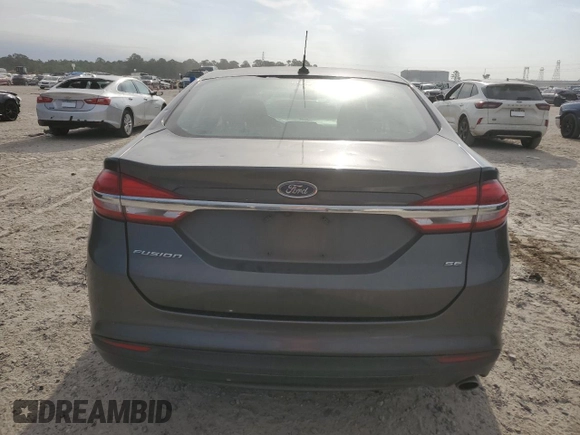 2017 Ford Fusion SE z VIN 3FA6P0H73HR294017, wystawiony jako Copart lot #50665935 z przebiegiem 62 426 mil mil oraz Czysty tytuł • Clean title. Historia ofert i sprzedaży dostępna na DreamBid. Obrazek 6.