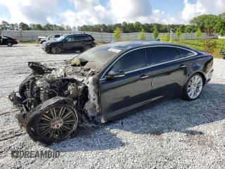 2015 Jaguar XJ Portfolio with VIN SAJWJ2GD7F8V90494, listed as a Copart auction lot 56824605 with Not provided miles and Salvage title. Bid and sale history available at DreamBid. Image 1.