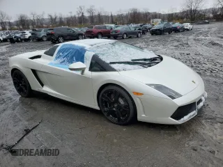 2012 Lamborghini Gallardo z VIN ZHWGU6BZ7CLA11933, wystawiony jako Copart lot #78625754 z przebiegiem Nie podano mil oraz Szkody całkowita. Historia ofert i sprzedaży dostępna na DreamBid. Obrazek 4.