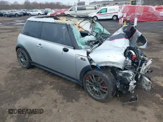 2006 MINI Hardtop S with VIN WMWRE33546TL23876, listed as a IAAI auction lot 41858060 with 146,359 mi miles and . Bid and sale history available at DreamBid. Image 1.