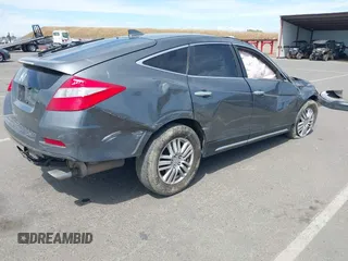2013 Honda Crosstour EX-L z VIN 5J6TF3H52DL004465, wystawiony jako IAAI lot #42268992 z przebiegiem 166 873 mil mil oraz . Historia ofert i sprzedaży dostępna na DreamBid. Obrazek 4.