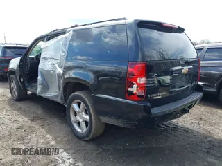 2010 Chevrolet Suburban LTZ with VIN 1GNUKKE31AR271504, listed as a IAAI auction lot 41870727 with 187,198 mi miles. Bid and sale history available at carsss.com. Image 3.
