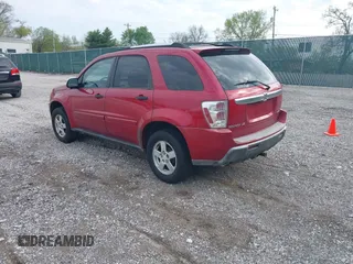 2005 Chevrolet Equinox LS with VIN 2CNDL23F756046004, listed as a IAAI auction lot 42031984 with 142,056 mi miles. Bid and sale history available at carsss.com. Image 3.