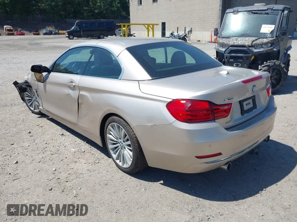 2015 BMW 4 Series 435i xDrive with VIN WBA3T7C51FP942320, listed as a IAAI auction lot 42584318 with 81,814 mi miles and . Bid and sale history available at DreamBid. Image 3.