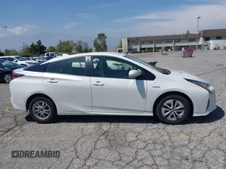 2016 Toyota Prius Four with VIN JTDKARFUXG3511034, listed as a IAAI auction lot 42137394 with 77,424 mi miles. Bid and sale history available at carsss.com. Image 13.