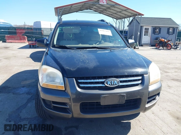 2007 Kia Sportage LX with VIN KNDJF724877313178, listed as a IAAI auction lot 41863492 with 199,138 mi miles. Bid and sale history available at carsss.com. Image 12.