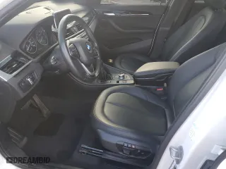 2017 BMW X1 xDrive28i with VIN WBXHT3C31H5F85452, listed as a Copart auction lot 50351125 with 61,954 mi miles and Salvage Title. Bid and sale history available at carsss.com. Image 7.