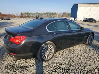 2011 BMW 7 Series 740i with VIN WBAKA4C50BC613111, listed as a Copart auction lot 78597934 with 103,778 mi miles and Salvage Title. Bid and sale history available at carsss.com. Image 3.