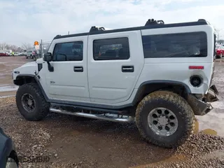 2004 Hummer H2 with VIN 5GRGN23U64H122670, listed as a IAAI auction lot 41908517 with 189,736 mi miles. Bid and sale history available at carsss.com. Image 14.