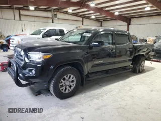 2017 Toyota Tacoma SR5 with VIN 5TFCZ5AN8HX067720, listed as a Copart auction lot 84801184 with 76,148 mi miles and Salvage title. Bid and sale history available at DreamBid. Image 1.