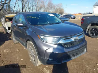 2018 Honda CR-V EX-L with VIN 7FARW2H89JE051063, listed as a IAAI auction lot 41748142 with 90,834 mi miles. Bid and sale history available at carsss.com. Image 1.