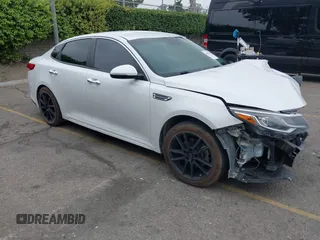 2020 Kia Optima LX with VIN 5XXGT4L33LG422463, listed as a IAAI auction lot 42418544 with 83,226 mi miles and . Bid and sale history available at DreamBid. Image 1.