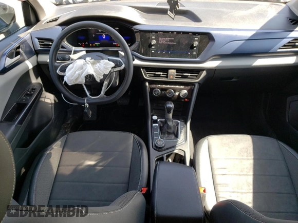 2023 Volkswagen Taos z VIN 3VV7X7B2XPM316144, wystawiony jako Copart lot #51211315 z przebiegiem 108 831 mil mil oraz Szkody całkowita. Historia ofert i sprzedaży dostępna na DreamBid. Obrazek 8.