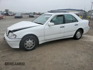 2000 Mercedes-Benz C 230 Kompressor with VIN WDBHA24G1YF946926, listed as a Copart auction lot 70884494 with 115,791 mi miles and Salvage Title. Bid and sale history available at carsss.com. Image 1.
