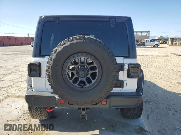 2021 Jeep Wrangler Unlimited Rubicon с VIN 1C4JJXFG4MW838808, выставлен на аукционе Copart как лот 57684355 с пробегом 45 240 миль миль и Списание • Salvage title. История ставок и продаж доступна на DreamBid. Изображение 6.