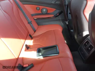 2019 BMW M4 with VIN WBS4Y9C5XKAG67446, listed as a IAAI auction lot 41669865 with 103,230 mi miles. Bid and sale history available at carsss.com. Image 8.
