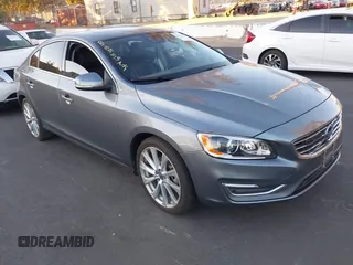 2018 Volvo S60 Inscription Platinum with VIN LYV402HM6JB172851, listed as a IAAI auction lot 41336363 with 77,591 mi miles. Bid and sale history available at carsss.com. Image 1.