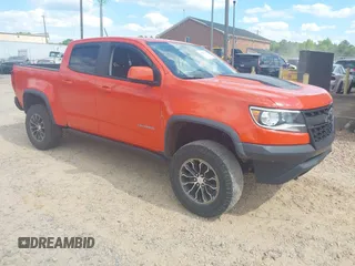 2019 Chevrolet Colorado 4WD ZR2 z VIN 1GCGTEEN5K1158788, wystawiony jako IAAI lot #42204692 z przebiegiem 64 840 mil mil oraz . Historia ofert i sprzedaży dostępna na DreamBid. Obrazek 1.