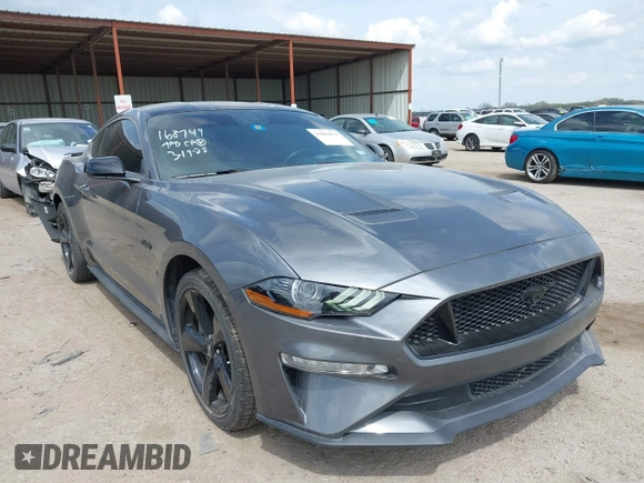 2021 Ford Mustang GT with VIN 1FA6P8CF5M5111095, listed as a IAAI auction lot 41884815 with 39,259 mi miles and . Bid and sale history available at DreamBid. Image 1.