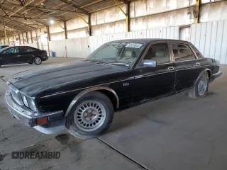 1989 Jaguar XJ with VIN SAJKY154XKC559724, listed as a Copart auction lot 66578495 with 83,600 mi miles and Clean title. Bid and sale history available at DreamBid. Image 1.